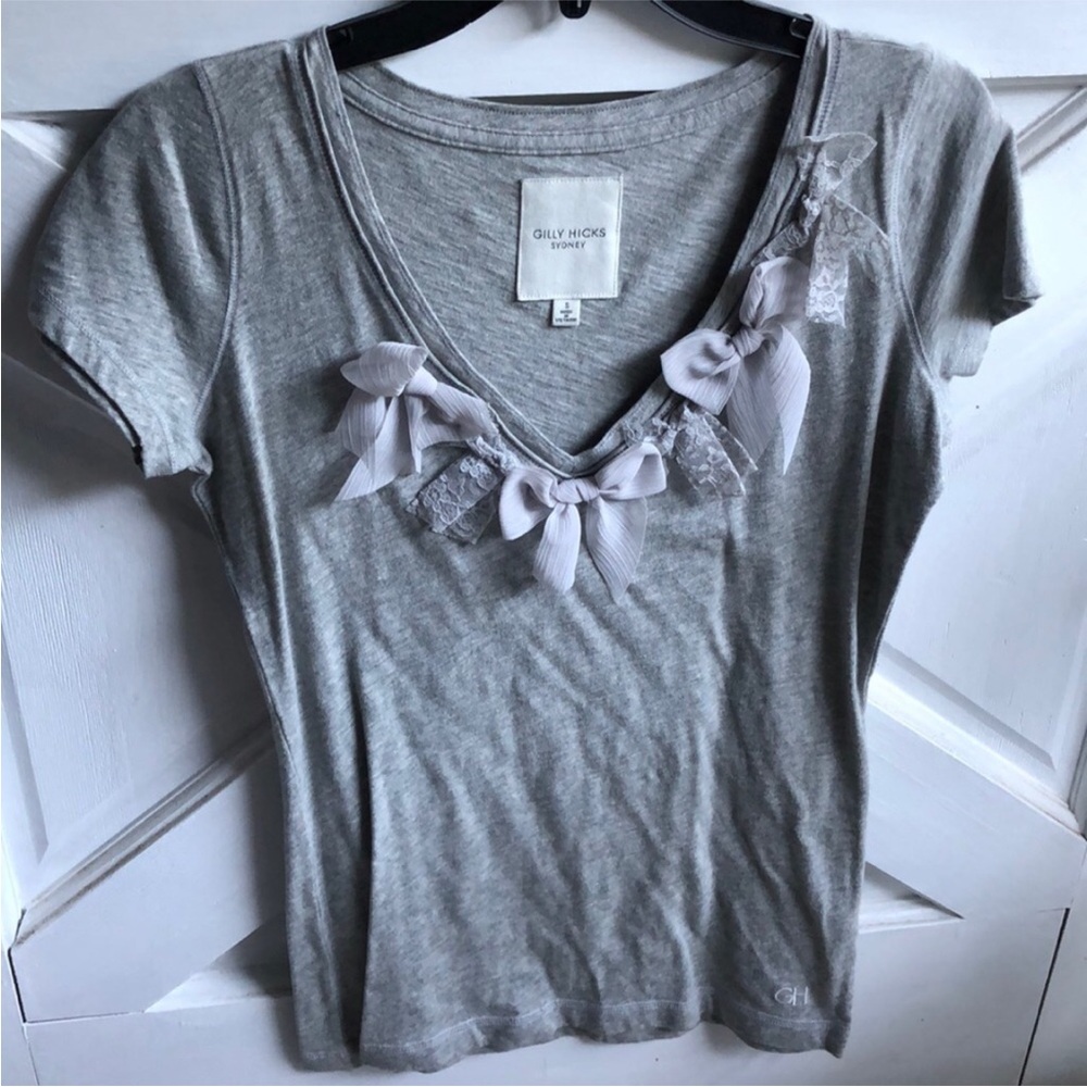 NWOT Gilly Hicks Top. Lots of bows that are made of lace & sheer fabric. Vintage